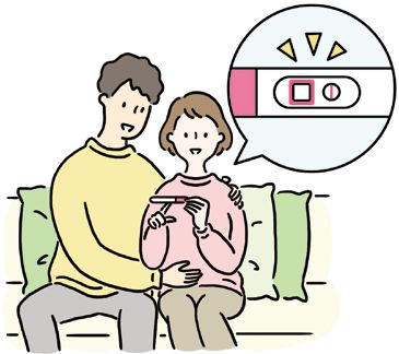 検査薬を確認する夫婦
