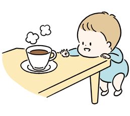 手を伸ばす赤ちゃん