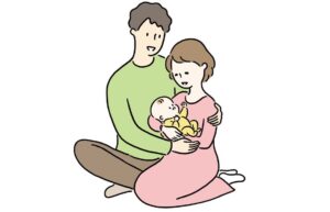 赤ちゃんを抱く夫婦