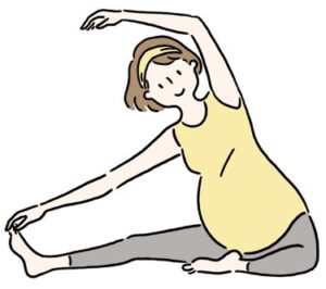 ストレッチをする妊婦